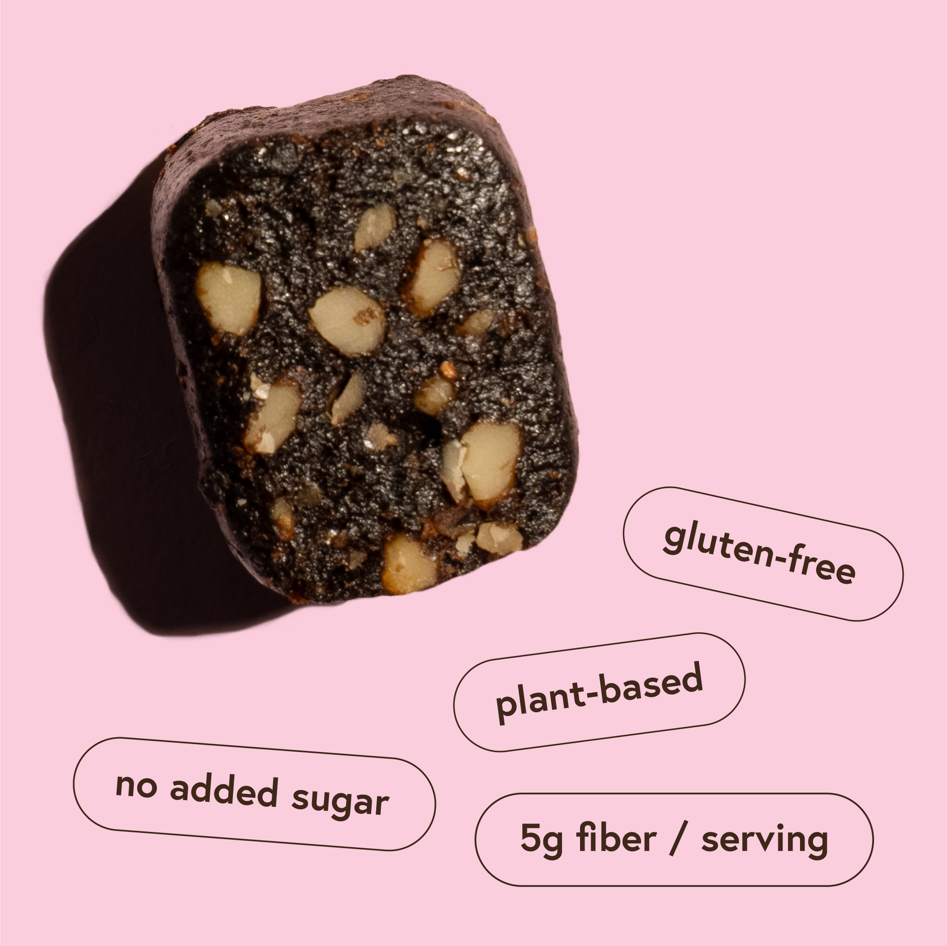 Fig bar with nuts on a pink background with health benefits text