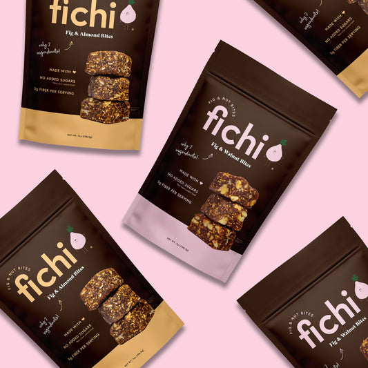 Fichi variety snack packages on a pink background.
