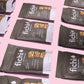 Multiple packages of Fichi 
Fig and Walnut snack bites on a pink background.